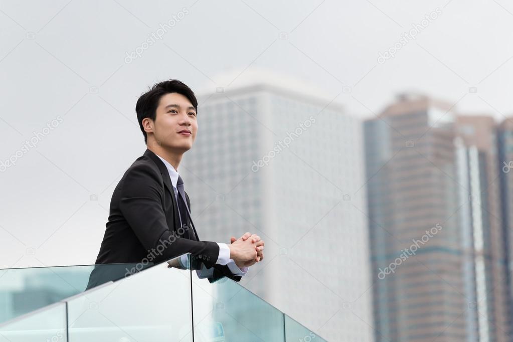 Asian young businessman in business suit
