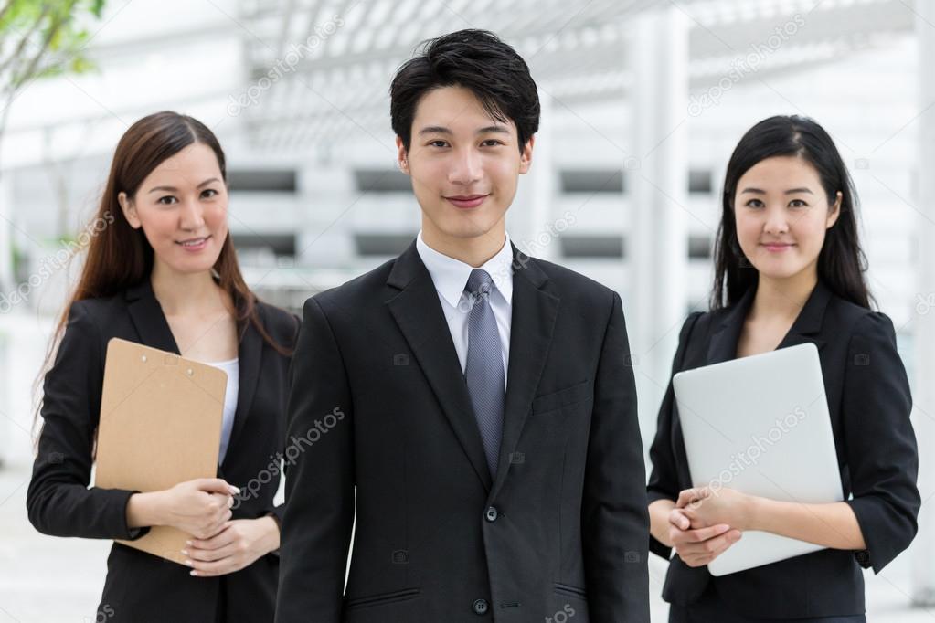 young Asian business team outdoors