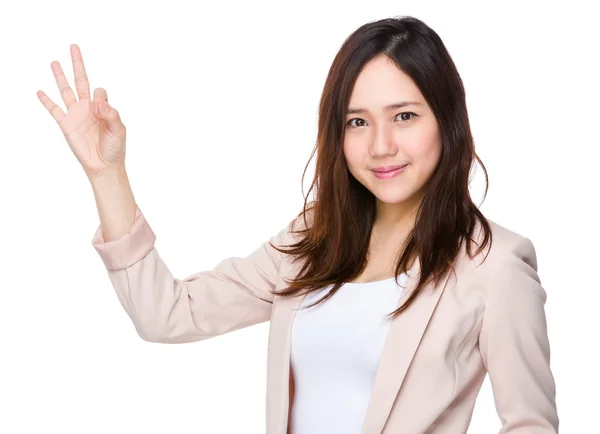 Asian young businesswoman in business suit — Stock Photo, Image