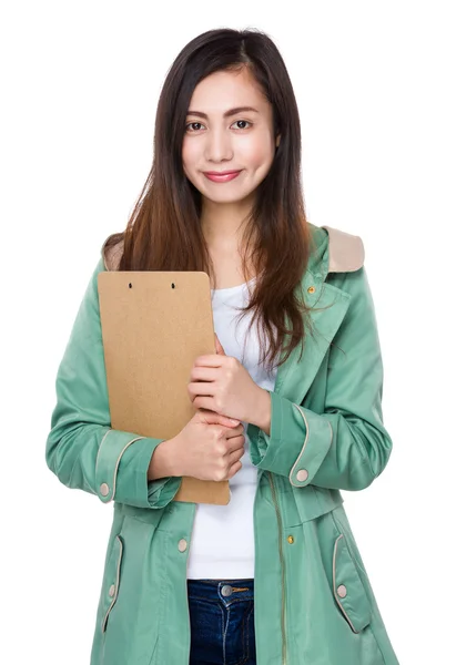 Asijská dívka v zeleném kabátě — Stock fotografie