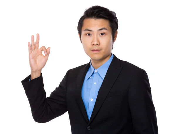 Asiatiska stilig affärsman i svart kostym — Stockfoto