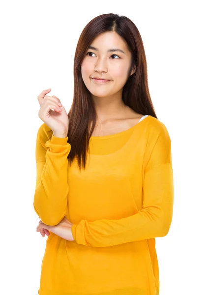 Asian young woman in yellow sweater — Stock Photo, Image