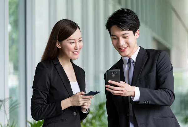 Asian business partners discuss — Stock Photo, Image