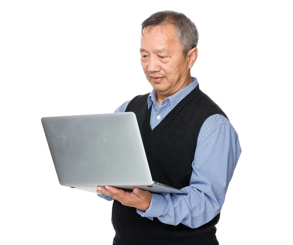 Asian old man in knitted waistcoat — Stock Photo, Image