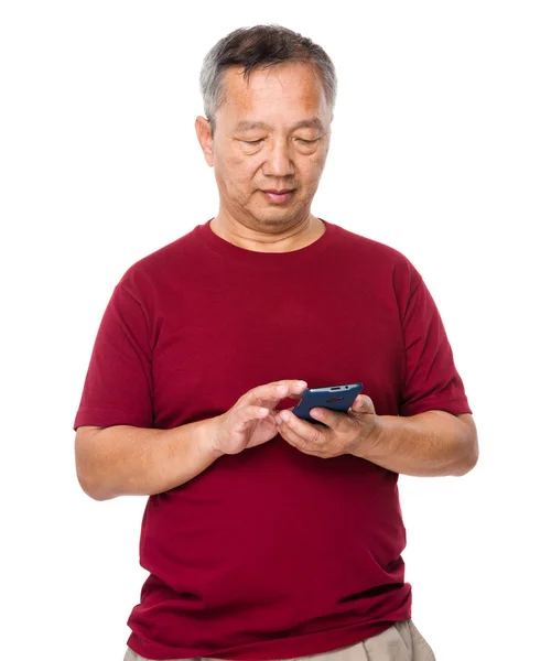 Asian old man in red t-shirt — Stock Photo, Image