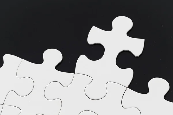 Zwykły biały puzzle układanki — Zdjęcie stockowe