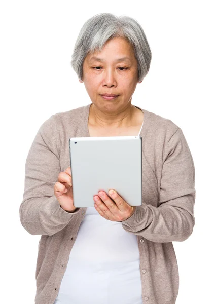 Asian mature woman in beige cardigan — Stock Photo, Image