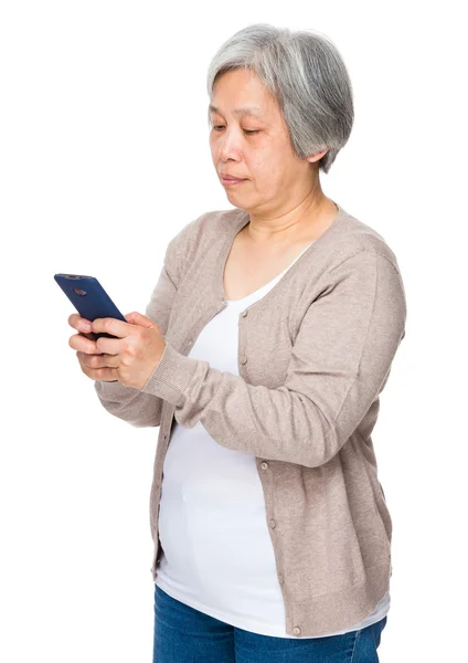 Asian mature woman in beige cardigan — Stock Photo, Image