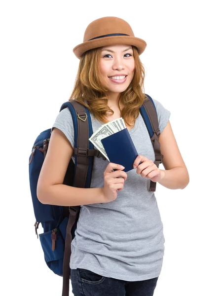 Woman holding passport with money — Stock Photo, Image