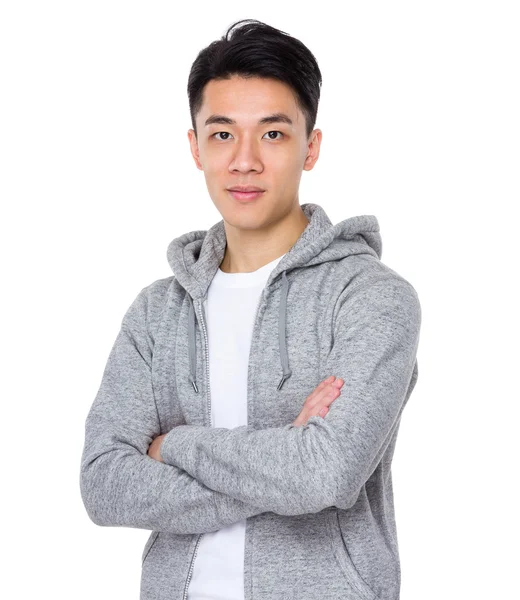 Asiatische schöner Mann in grauen Kapuzenpullover — Stockfoto