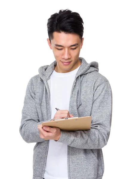 Ásia bonito homem no cinza hoodie — Fotografia de Stock