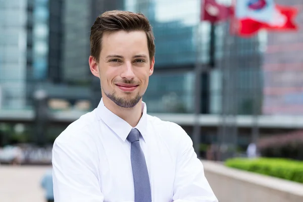 Caucasian handsome businessman in white shirt — Stock Photo, Image