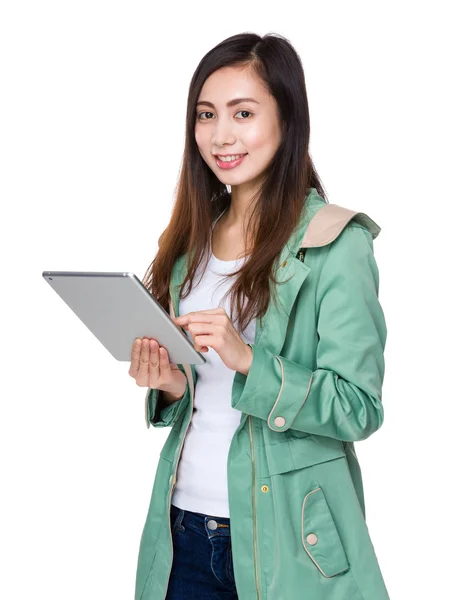 Asian young woman in green coat — Stock Photo, Image