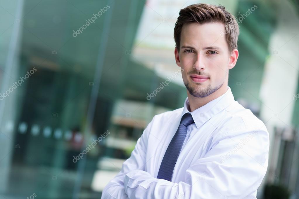 Caucasian handsome businessman in white shirt