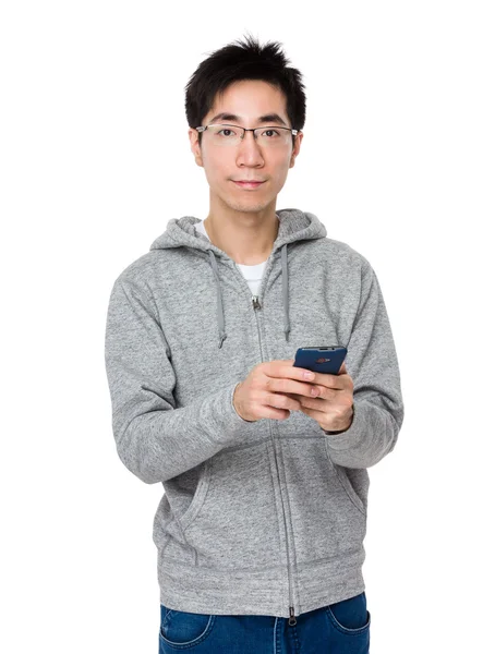 Ung asiatisk man i grå hoodie — Stockfoto