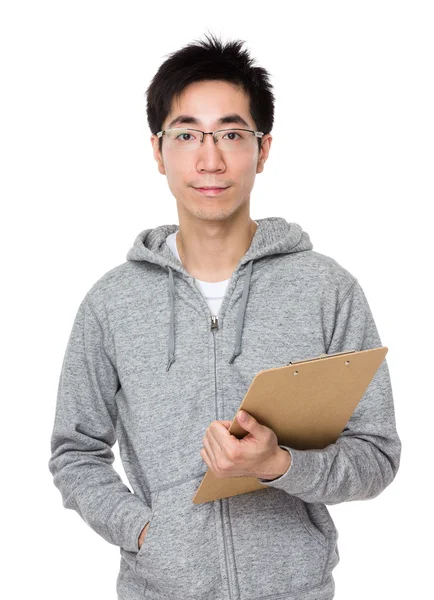 Ung asiatisk man i grå hoodie — Stockfoto