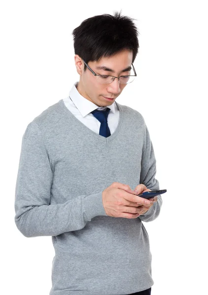 亚洲年轻的商人，在灰色毛衣 — 图库照片