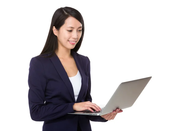 Asian young businesswoman in business suit — Stock Photo, Image