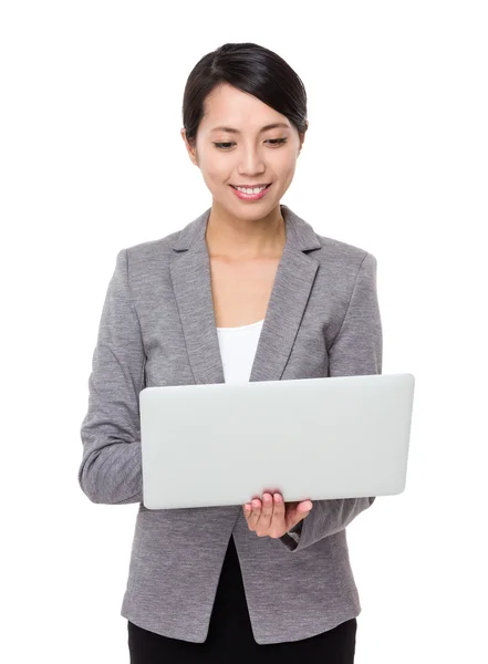 Asian young businesswoman in business suit — Stock Photo, Image