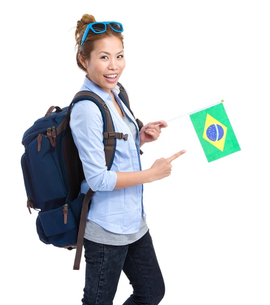 Woman with finger point to Brazil flag — Stok fotoğraf