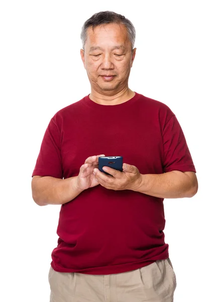 Asian old man in red t-shirt — Stock Photo, Image