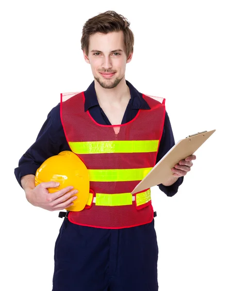 Construction site worker holding helmet — Stock Photo, Image