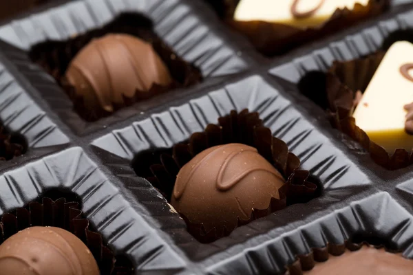 Doces de chocolate na caixa — Fotografia de Stock