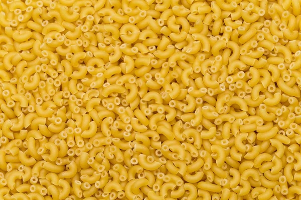 Raw pasta background — Stock Photo, Image