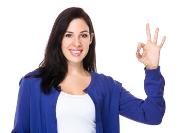 beautiful brunette woman in blue cardigan