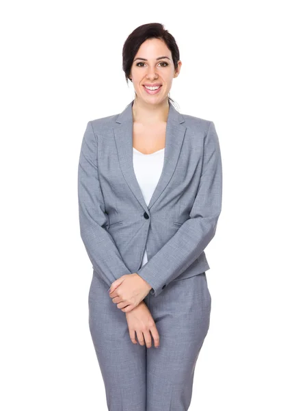 Beautiful brunette businesswoman in business suit — Stockfoto