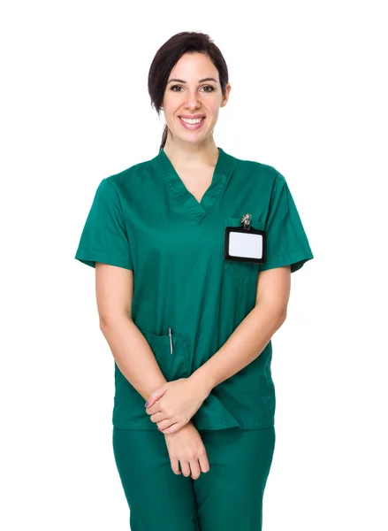 Brunette woman doctor in surgical uniform — Stock fotografie