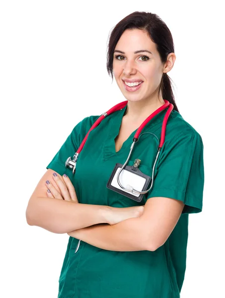 Brunette woman doctor in surgical uniform — Stok fotoğraf