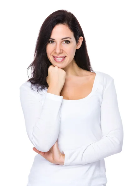 Beautiful brunette woman in white sweater — Stock Photo, Image