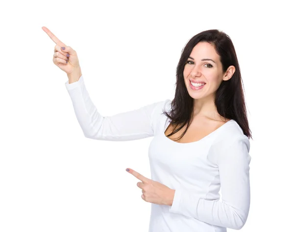 Beautiful brunette woman in white sweater — Stock Photo, Image