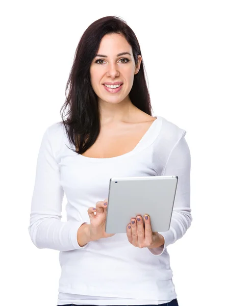 Beautiful brunette woman in white sweater — Stock Photo, Image