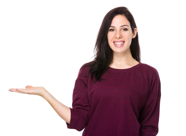 Beautiful brunette woman in red sweater — Stock Photo, Image