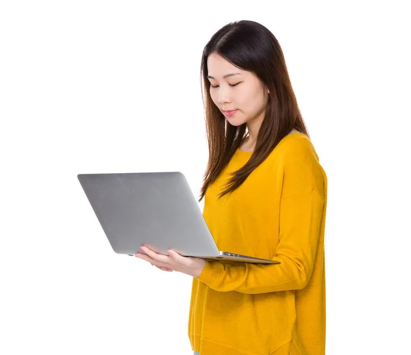 Asian young woman in yellow sweater — Stock Photo, Image