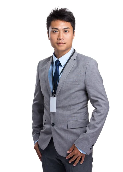 Asijské pohledný podnikatel v šedém obleku — Stock fotografie