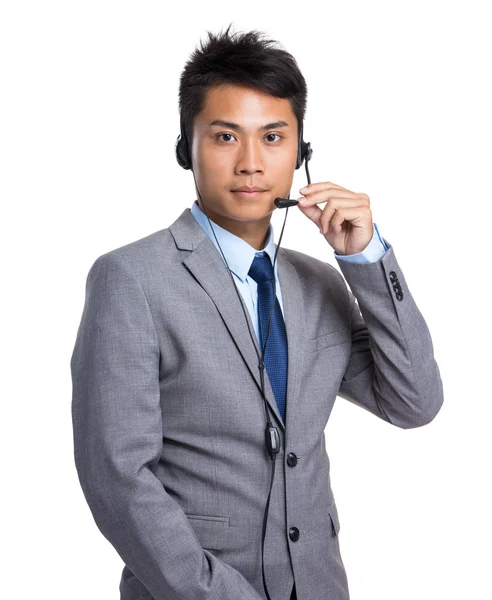 Asian male customer services representative — Stockfoto