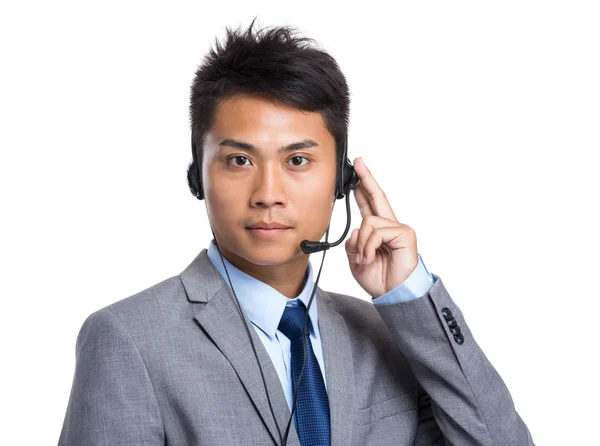 Asian male customer services representative — Stockfoto