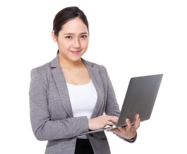 Asian young businesswoman in business suit — Stock Photo, Image