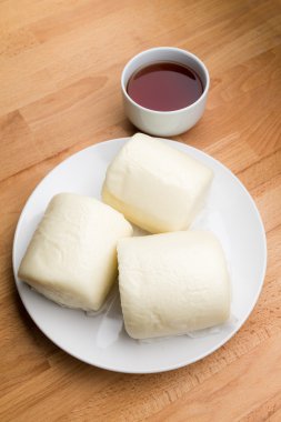 Steamed chinese bun and a cup of tea