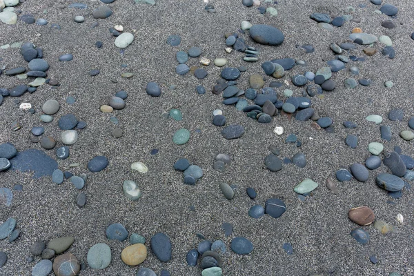 Différentes pierres grises plage de galets — Photo