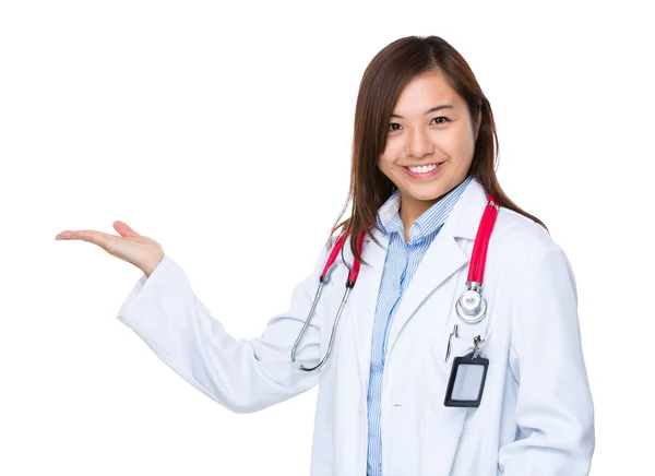 Doctor woman with hand showing a blank sign — Stock Photo, Image