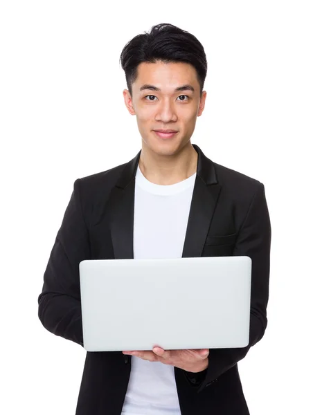 Asian businessman with laptop — Stock Photo, Image