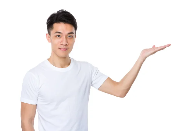 Asian man with hand showing a blank side — Stock Photo, Image