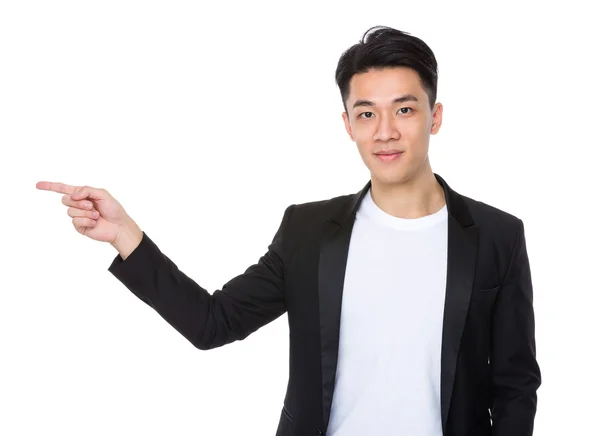 Азиатский бизнесмен с пальцем в сторону — стоковое фото