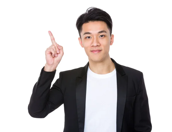 指でアジア系の若いビジネスマンがポイント アップ — ストック写真