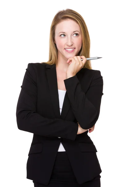 Young businesswoman think of an idea with holding a pen — Stock Photo, Image