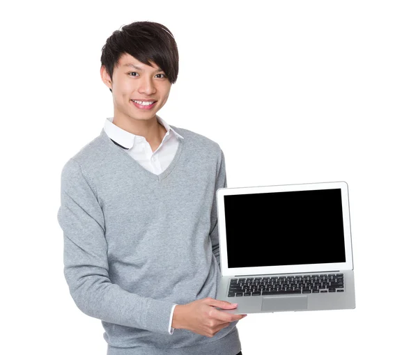 Asian Businessman showing the notebook — Stockfoto